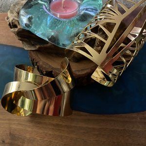 Two gold statement pieces bracelets :-)